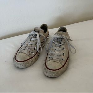 Used white low top converse